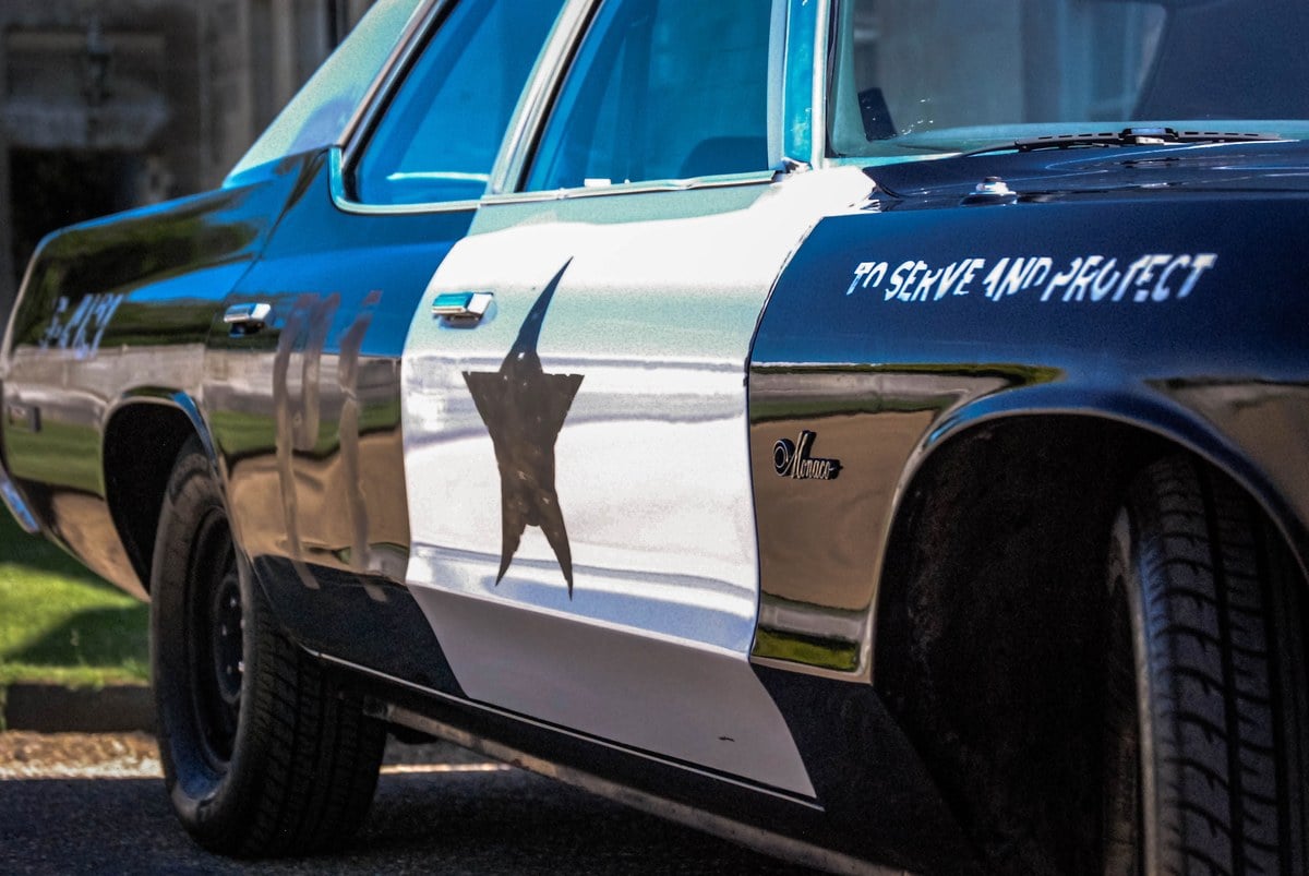Bluesmobile door, star and To Serve and Protect detail