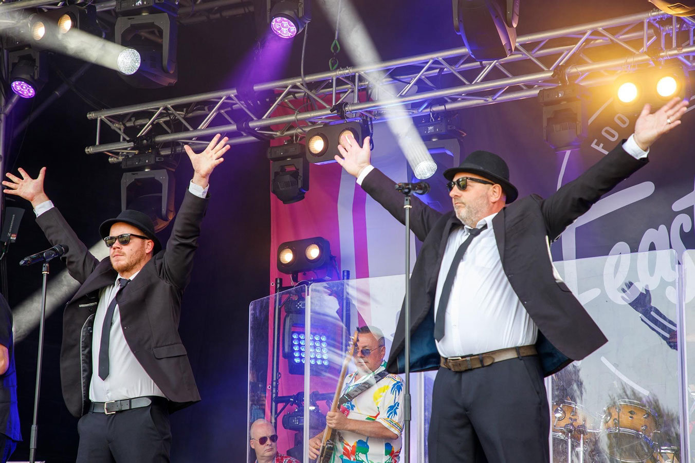 Jake and Elwood leading the live show on stage