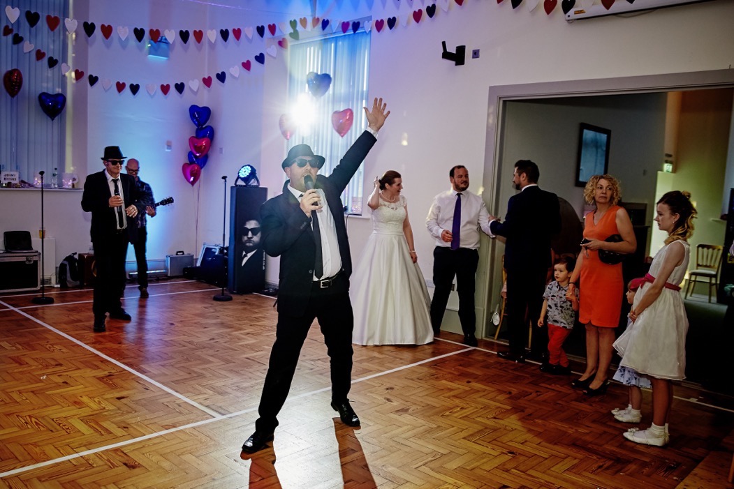 The band performing for wedding guests at Silverstone